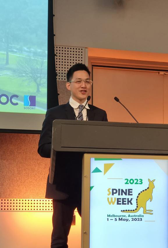 Jack Choong, Orthotist, presenting on scoliosis treatment during a consultation at the London Orthotic Consultancy