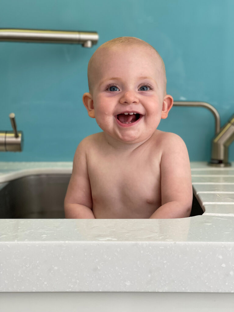 Matisse being happy sitting in the kitchen sink