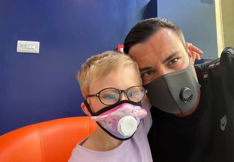 Austinwith his Dad in LOC waiting room